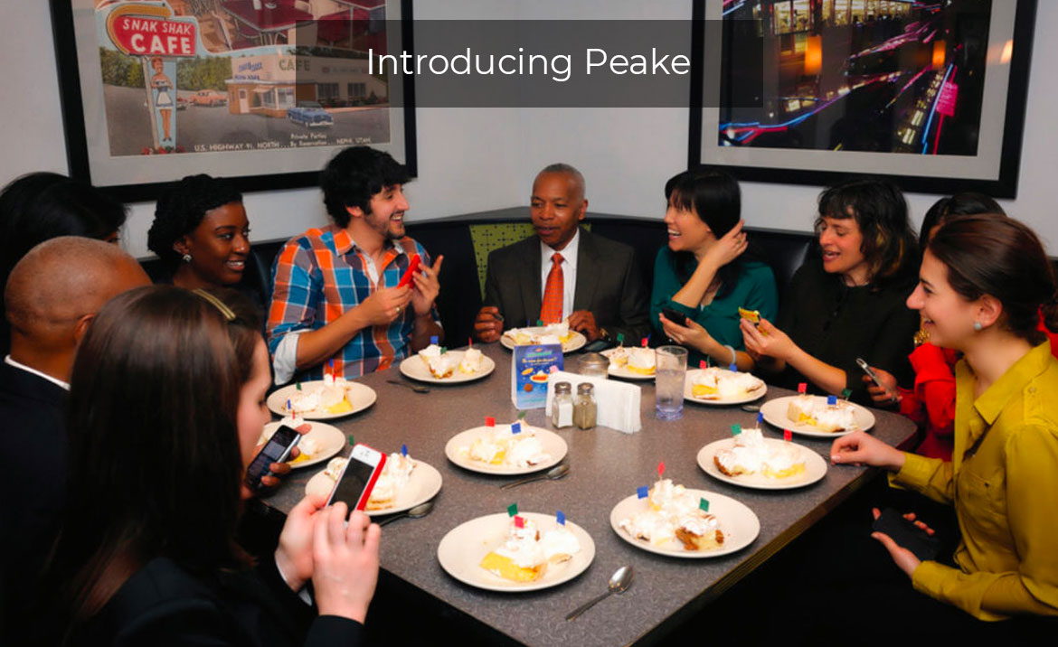 Fellows, staff, and clients at pie-tasting contest with Provost of Cambridge College, Dr. Elwood Robinson